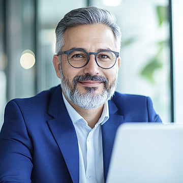 pngtree a happy middle aged man in blue suit and eyeglasses working image 17159729